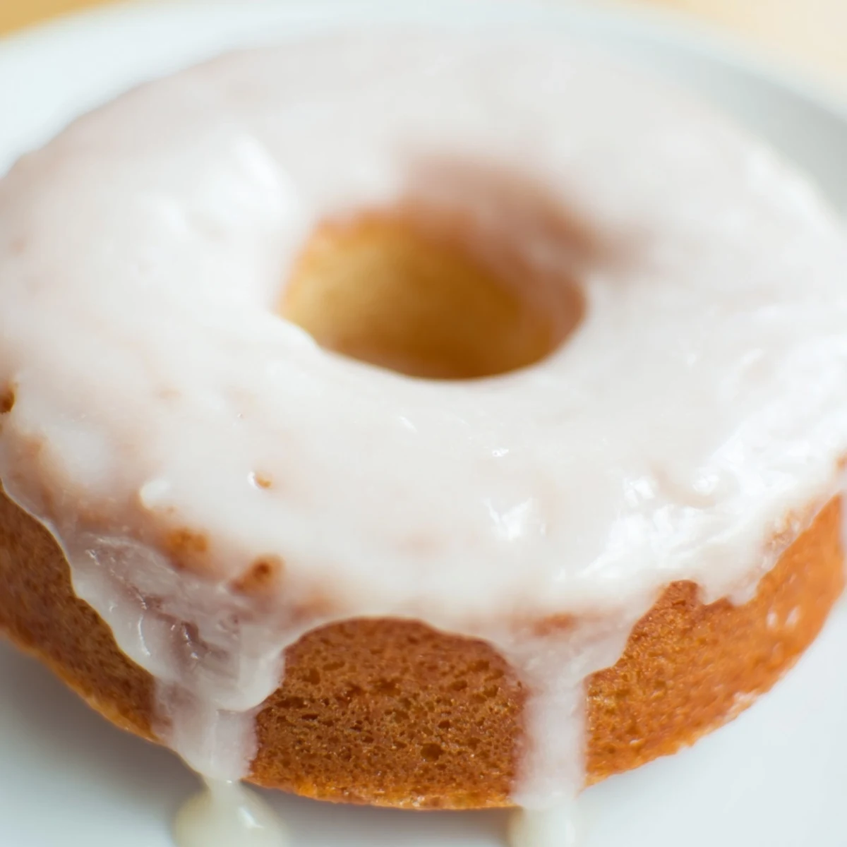 Light and fluffy Greek yogurt cake donuts arranged on a wire cooling rack