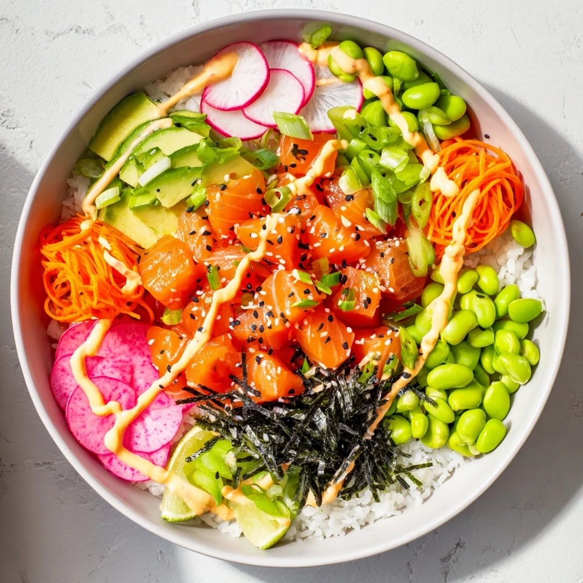 Colorful salmon and avocado poke bowl topped with fresh vegetables and sesame seeds